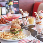 Elegant table setting with assorted dishes, representing the comprehensive insurance protection Gaylord Insurance provides to the restaurant industry.