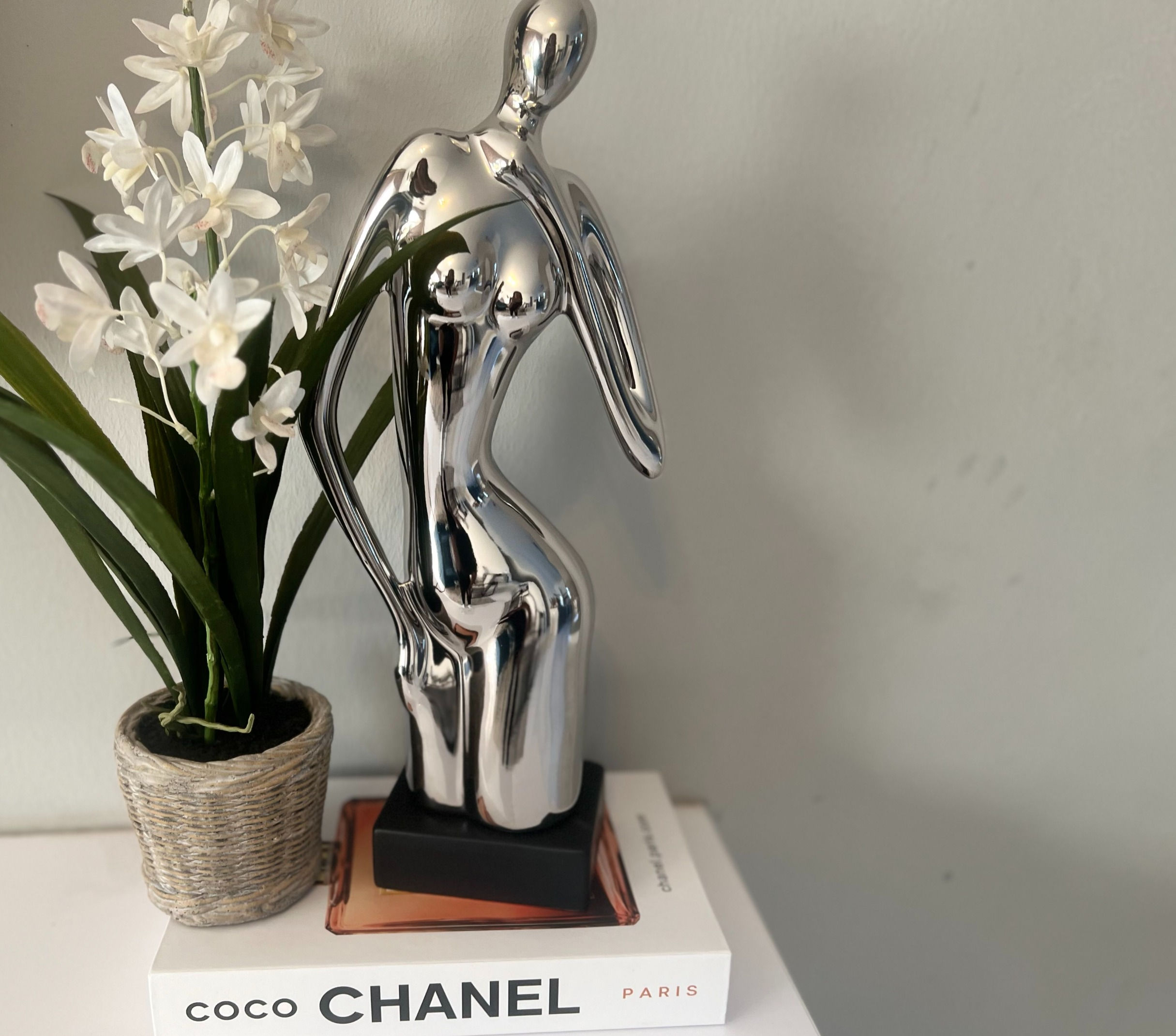 Silver figurine (Kneeling lady)