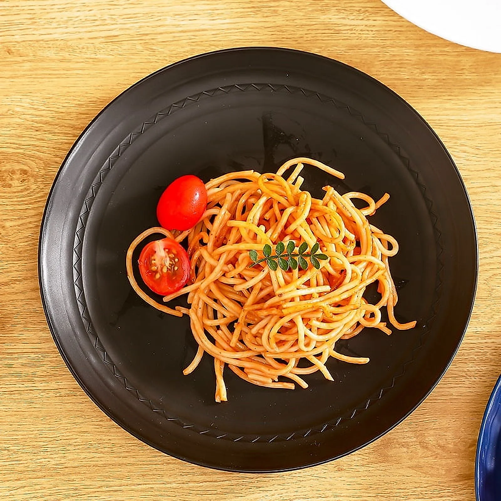 32-piece dinnerware set includes four large plates, four medium plates, four bowls, and four cups - all in sleek black color