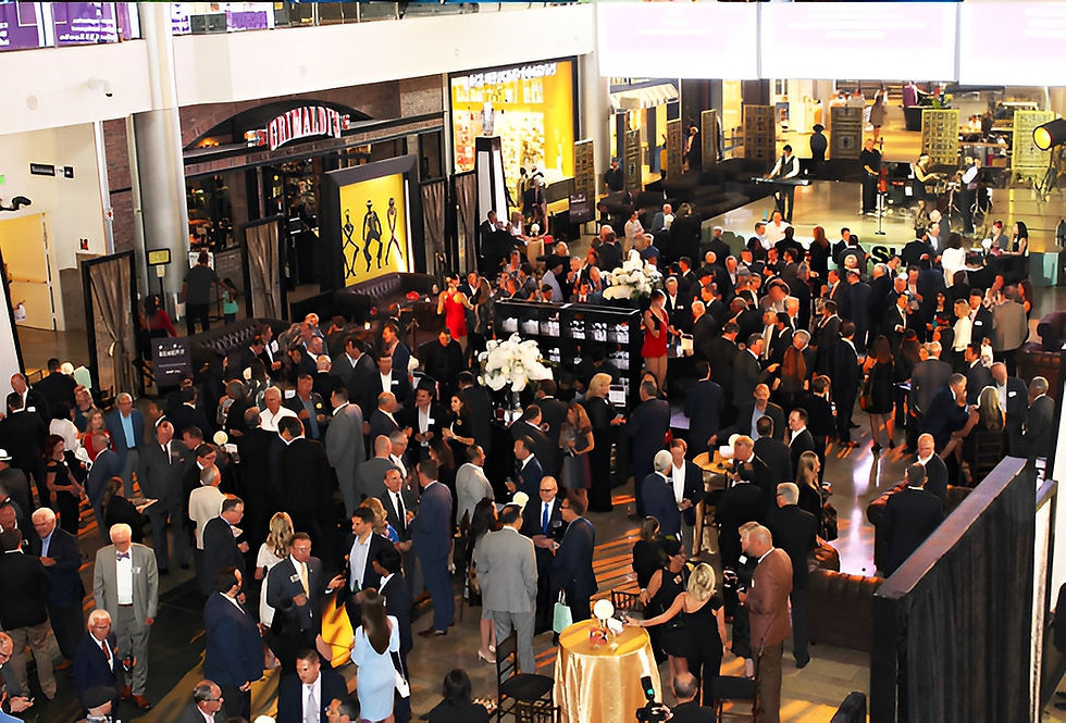 Crowd at an office event catered by Masterpiece Cuisine.
