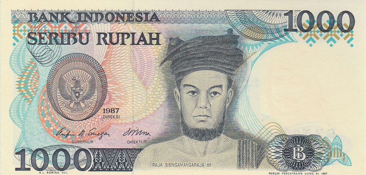 The observe features a portrait of Priest-King Sisingamangaraja XII (1849-1907).