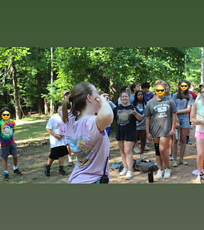 Teaching songs at camp.JPG