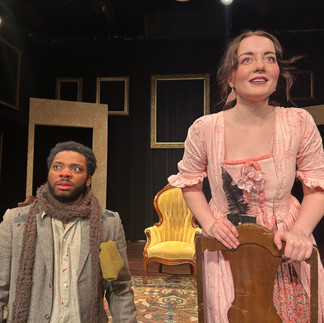 Girl kneels backwards on a chair, hopeful; man dressed as dog kneels beside her, confused