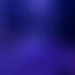 A dead body and a girl kneeling behind it, a vase has rolled to the background and the lighting is dark and blue