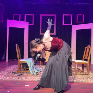 Huldey as a rock star singing her murder ballad