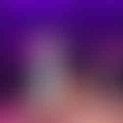 Girl standing on her chair with a mic, belting a rock song