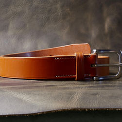 Front view of the Barossa belt in tan English bridle leather showing stainless steel buckle.