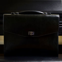 Black leather briefcase with stainless steel lock