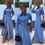 Thumbnail: Woman wearing a long-sleeve, button-down denim maxi dress with side cut-outs and a high slit, styled with black heels, sungla