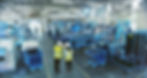 2 workers review data in a digitized factory