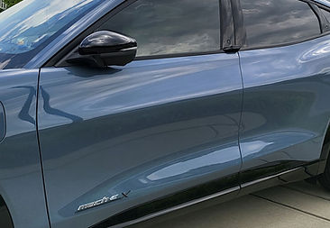 Blue car with Raleigh Window Tinting.jpg