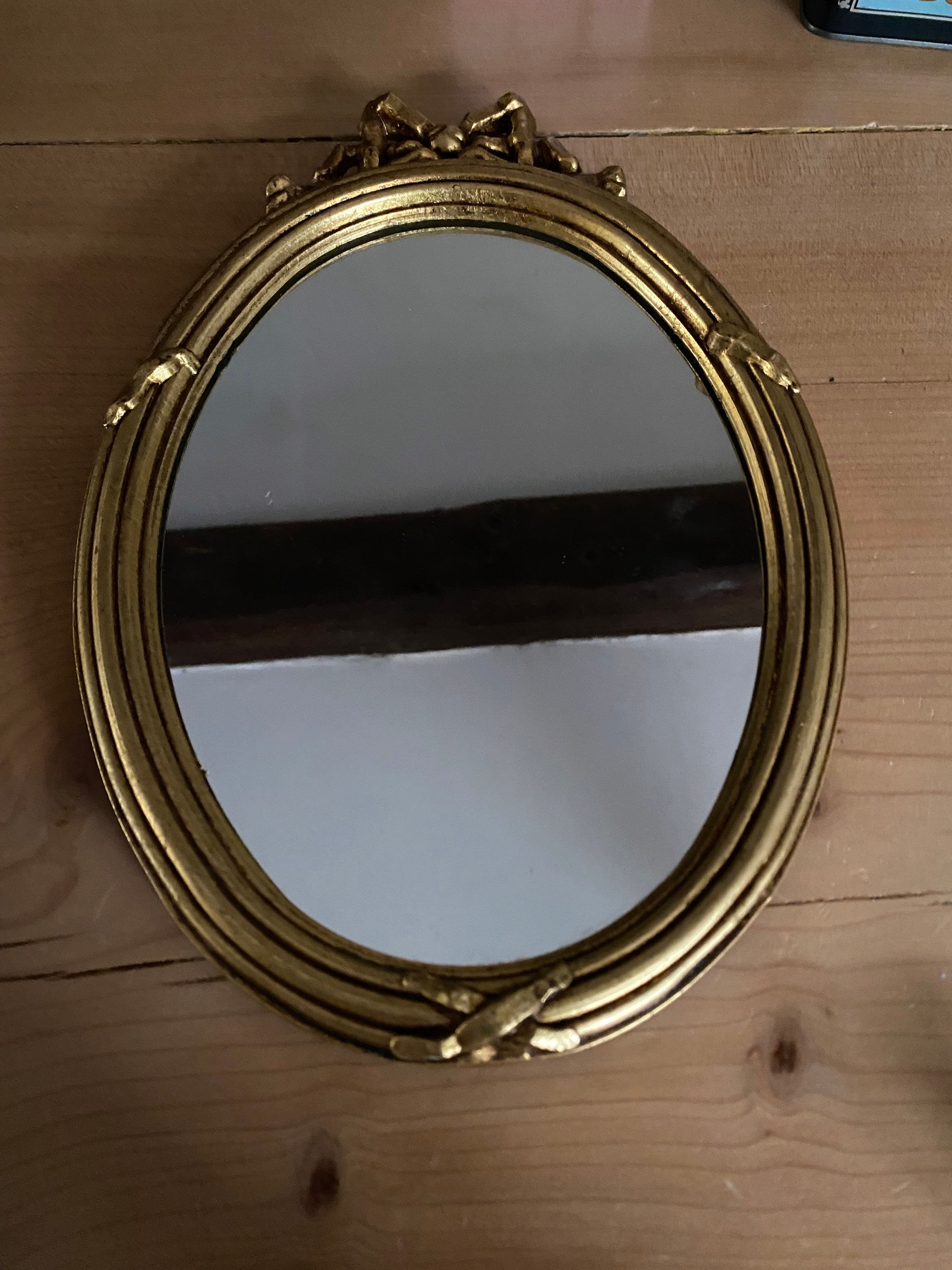Miroir ancien ovale bois avec noeud
