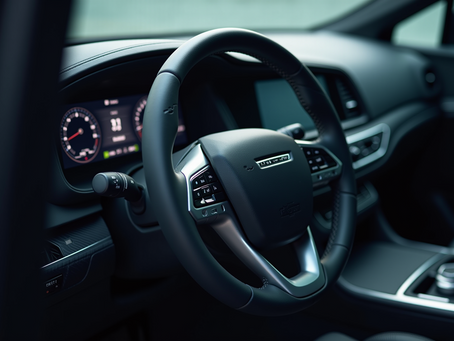 Interior view of a luxury black car showing the steering wheel, dashboard, and modern tech features used in executive car service.