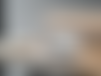 OSHC compliance manual on laptop with organised policy documents on desk