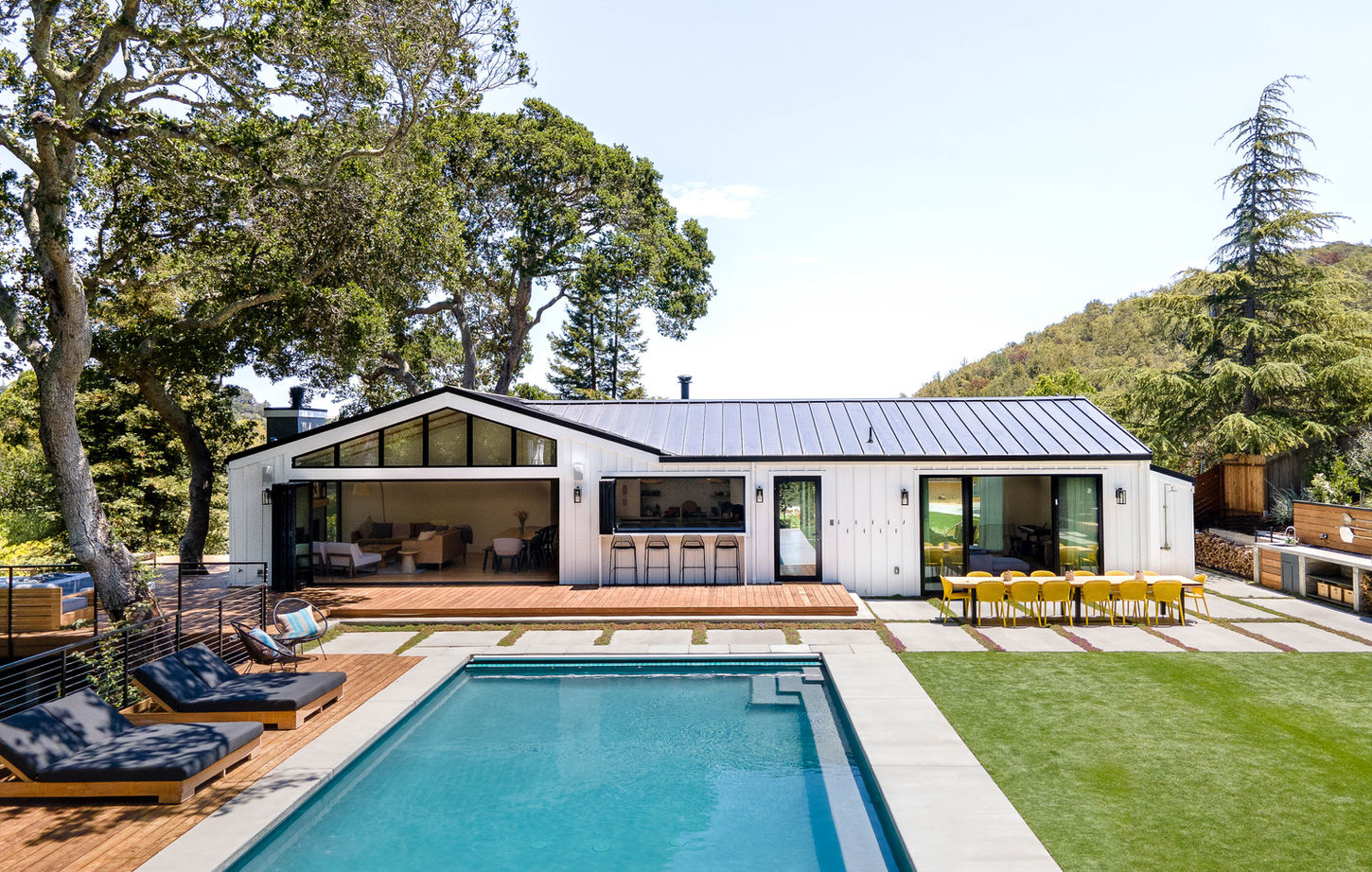 Whole-house modern remodel in Peacock Gap, San Rafael, CA showcasing a seamless design-build collaboration between G Design and G Family Construction, including beautiful indoor-outdoor living and pool by G Landscape Division."