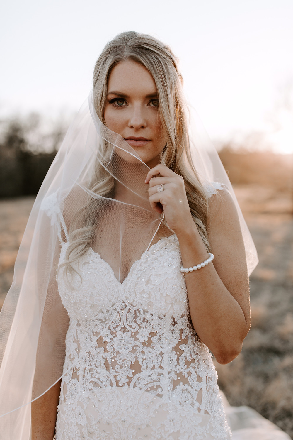 mermaid wedding dress with corded edge veil