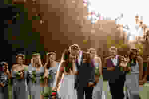 bridal party in light grey with floral crowns