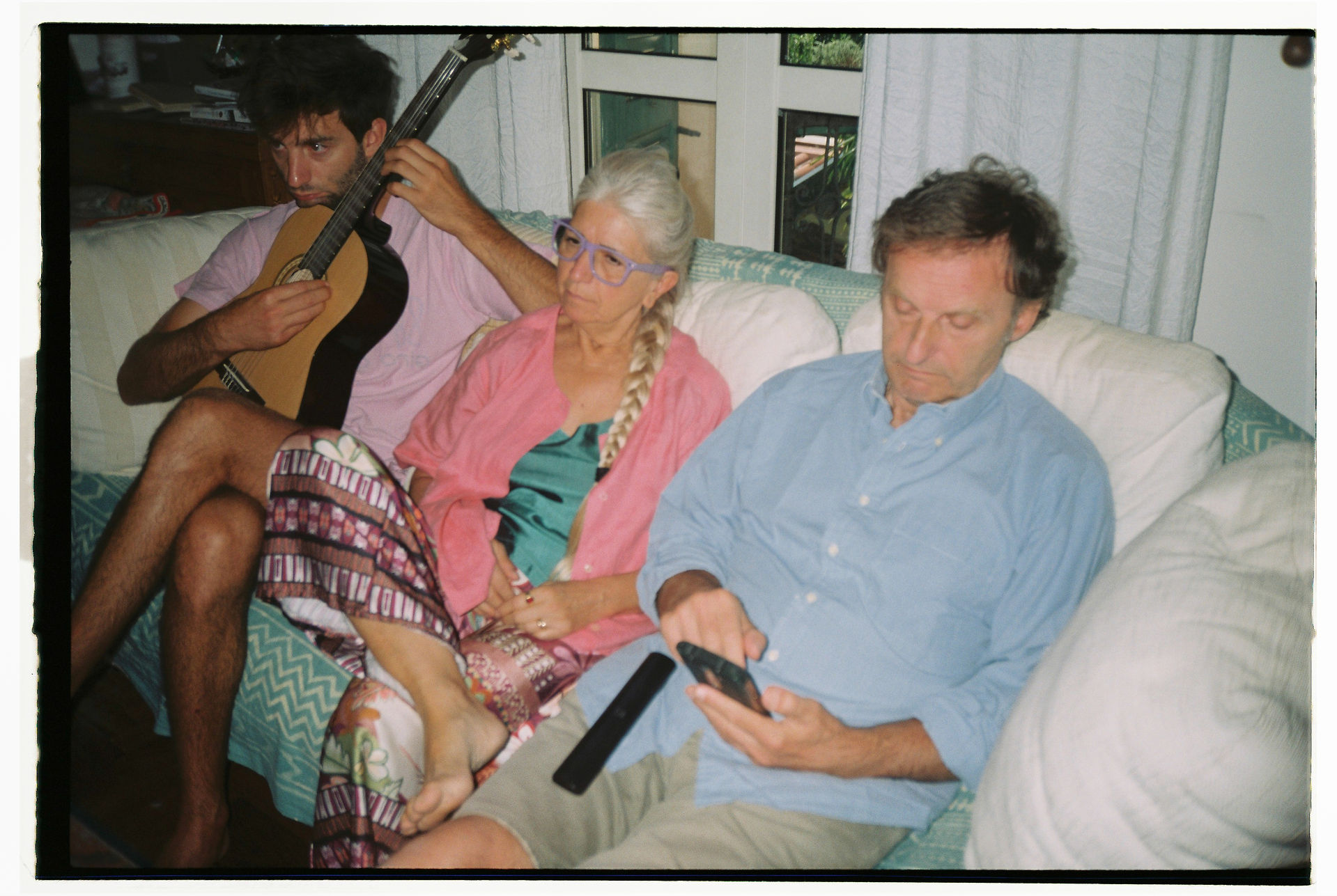 Family on the couch candid moment on film