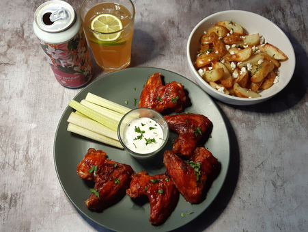 Spicy Chicken Wings with Blue Cheese Dipping Sauce & Thyme & Feta Potato Wedges