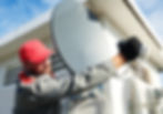 Service worker installing and fitting satellite antenna dish for cable TV_edited.jpg