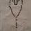 Thumbnail: Black rosary with white and black mushrooms