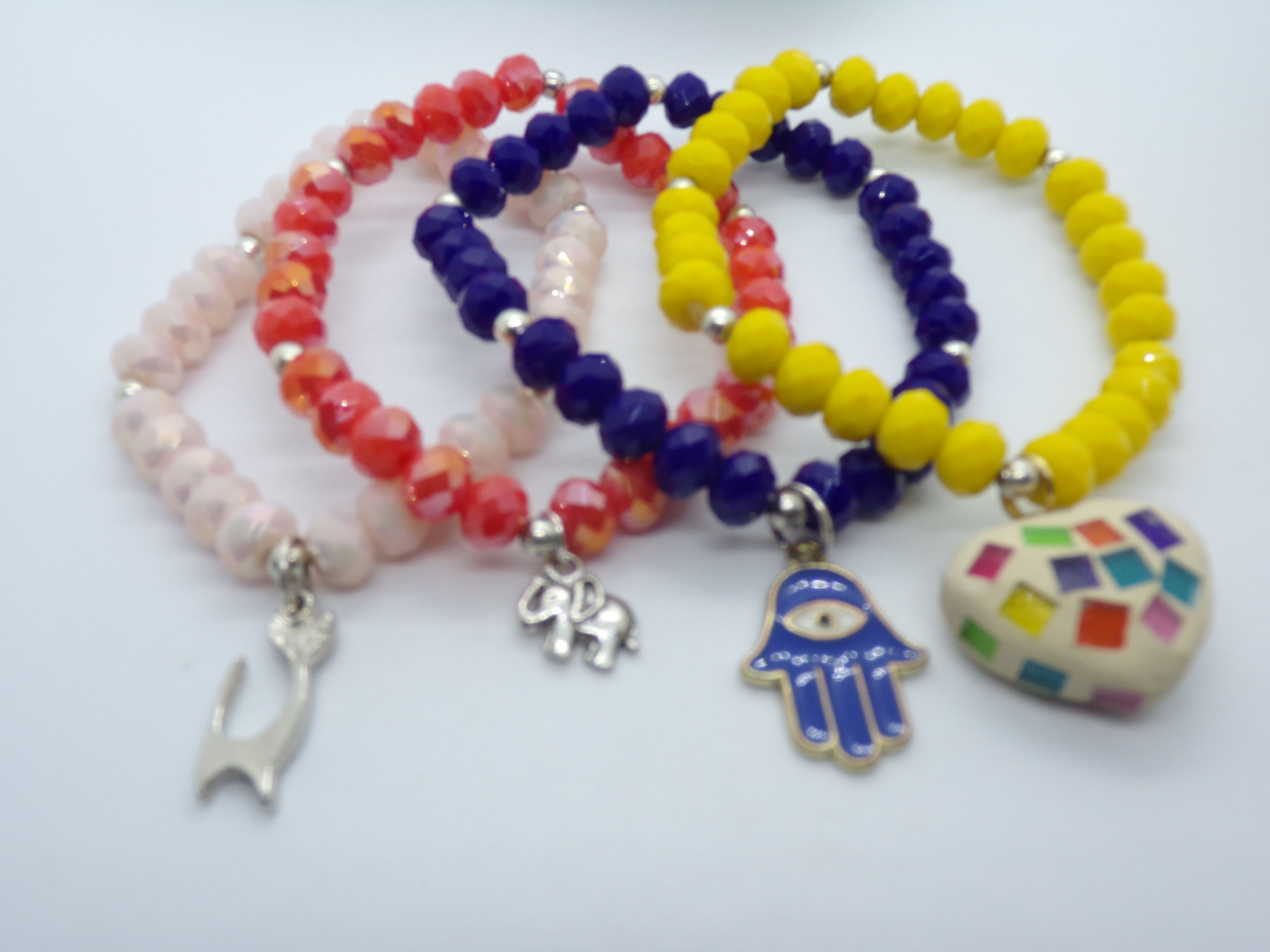 Pulseras (4) cristales con dijes