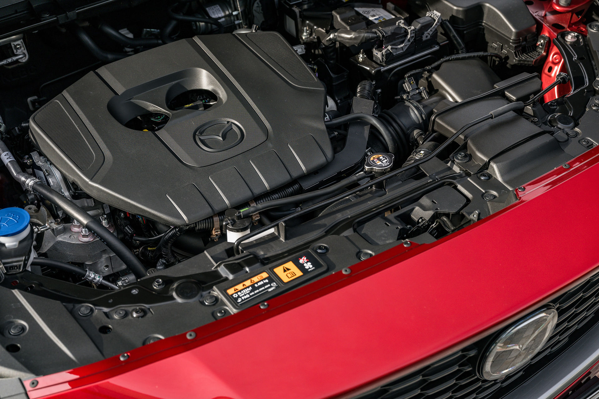 Mazda CX-5 2026 Exclusive-Line in Soul Red Crystal,  2,5 Liter Saugmotor Benziner Ansicht Motor
