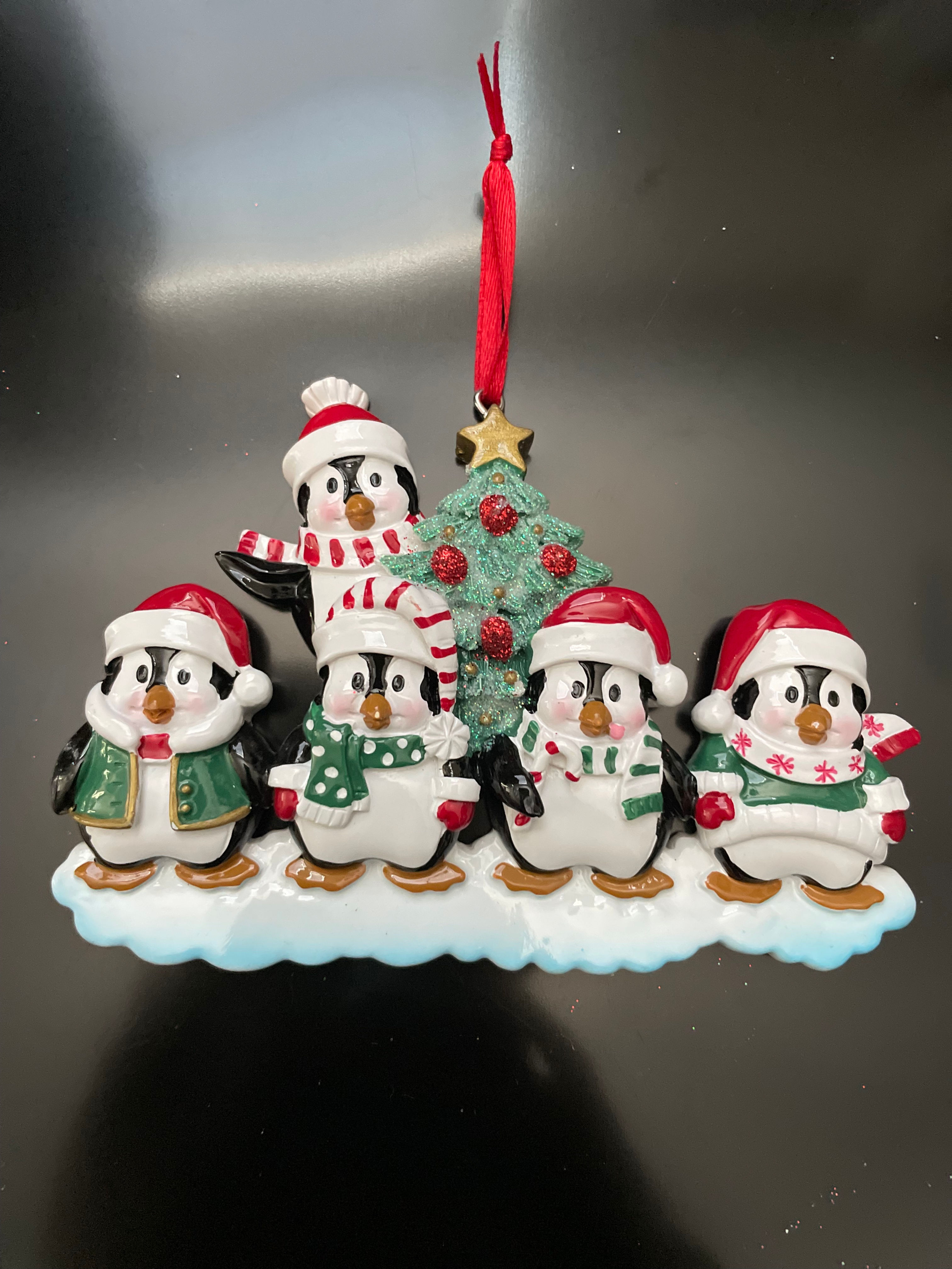 FAMILY OF 5 PENGUINS