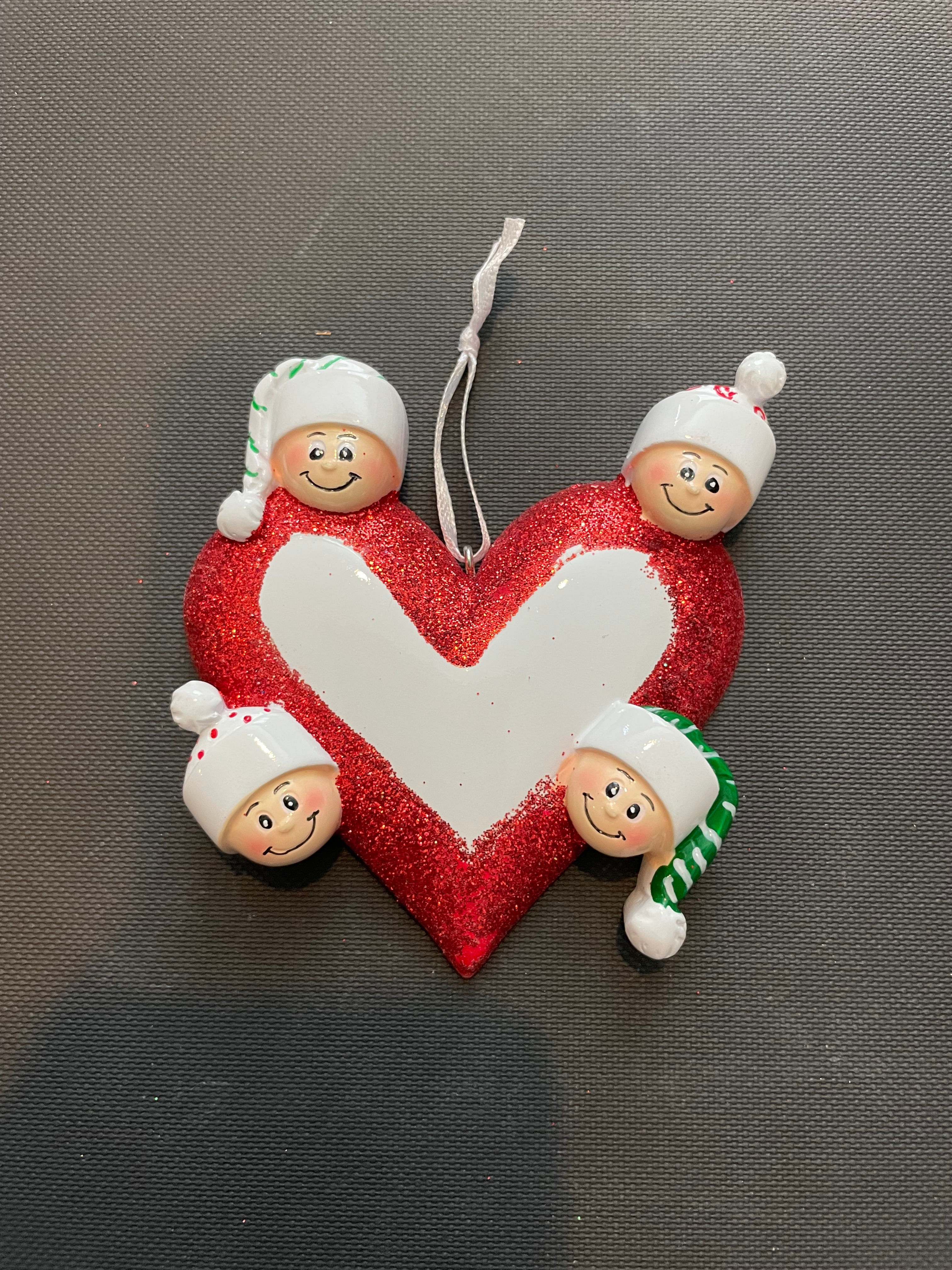 FAMILY OF 4 AROUND A HEART