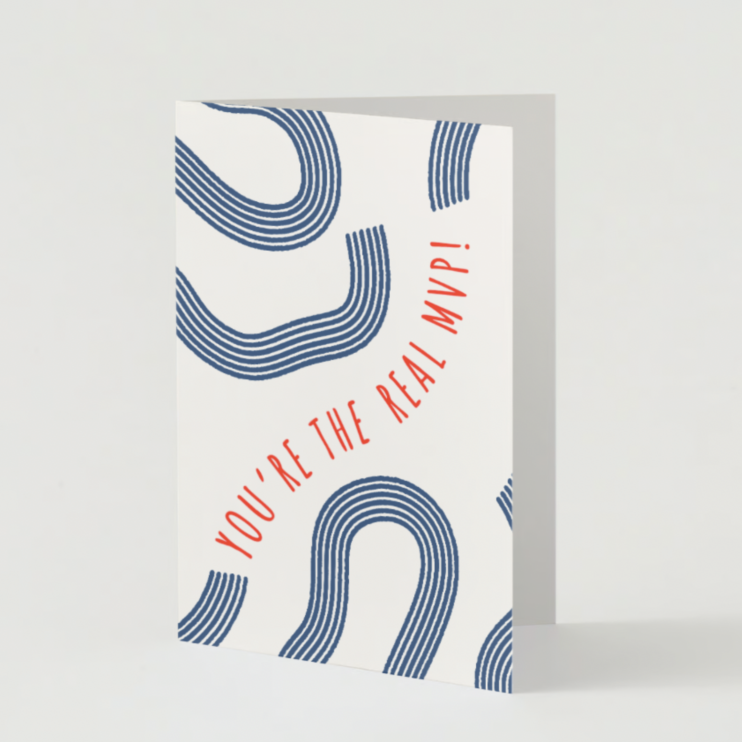White folded card with wavy graphics on the front and the text "You're the real MVP"