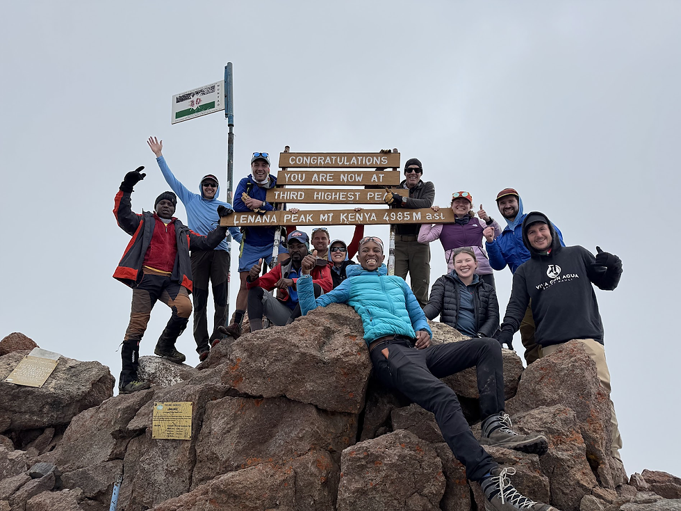 The team atop Lanana. The guy on the far right was named Daniel, another German guy who sort of randomly just joined our group for the entirety of Mt Kenya. His dad was a long-time corporate lawyer and died early without having chased any of the dreams he often spoke of. Daniel pivoted, shunning corporate life and choosing that of a vagabond. Given how often he stopped to smoke a cigarette, I was impressed with his fitness. He was kind and I liked him.
