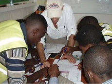 Dr Augeri training field team and planning surveys in Africa