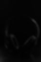 wireless-inear-headphones-insulated-with-black-leather-black-background.jpg