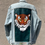 Thumbnail: hand painted and embroidered tiger on the back panel of an oversized John Gault jean jacket 
