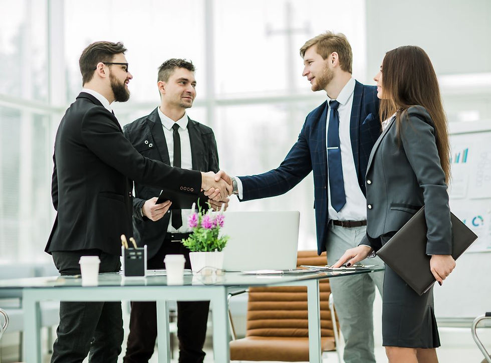 handshake-business-partners-after-signing-contract-workplace-modern-office
