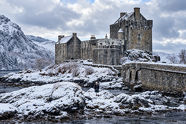 Local Highland guide at Eilean Donan Castle on a snowy day