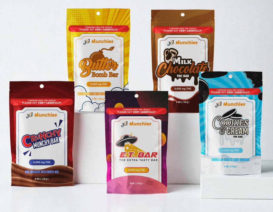 Group image of J&J Munchies edible chocolate bars in resealable pouches including Milk Chocolate, Butter Bomb, Cookies & Cream, Crunchy Munchy, and E.T. Bar.