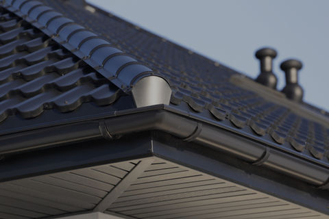 Corner%20of%20a%20Roof%20Gutter_edited.jpg