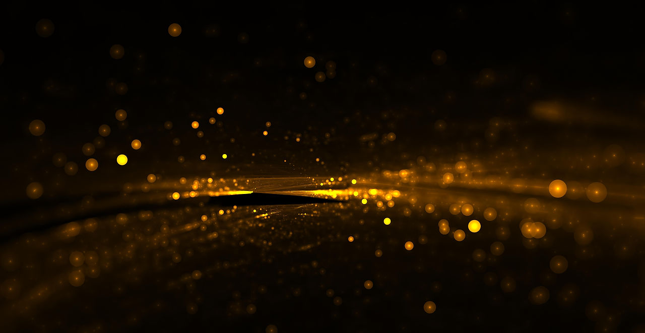 shiny-golden-particles-with-light-streak.jpg