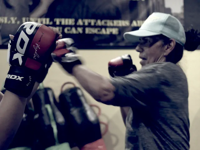 Paula going through boxing drills