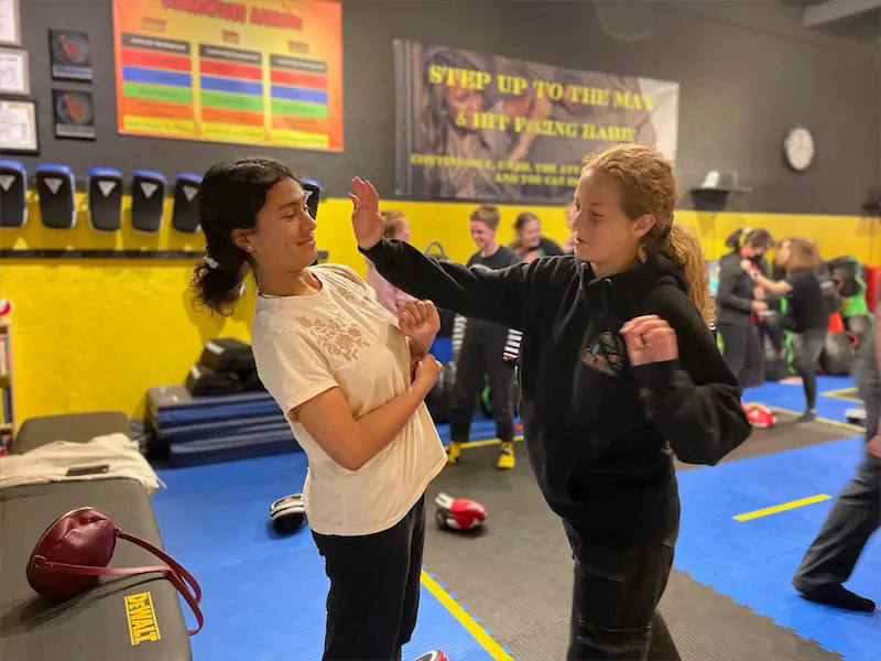 La Reina High School students learning self defense