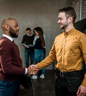 side-view-men-handshaking-agreement-after-meeting.jpg