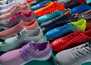 two rows of sneakers in a multitude of colors