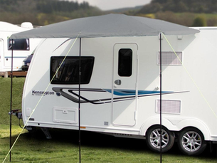 Sun canopy vs Caravanstore vs wind-out awning comparison on a caravan with IDS Camping and Leisure branding showing different awning types for UK touring and camping