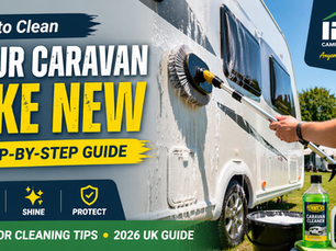 Cleaning the outside of a caravan using brush and caravan cleaner on a sunny campsite