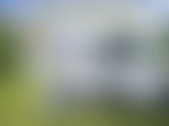 Motorhome being levelled on campsite using levelling ramps in the UK