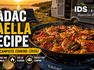 Cadac BBQ paella pan cooking fresh paella outdoors on a campsite