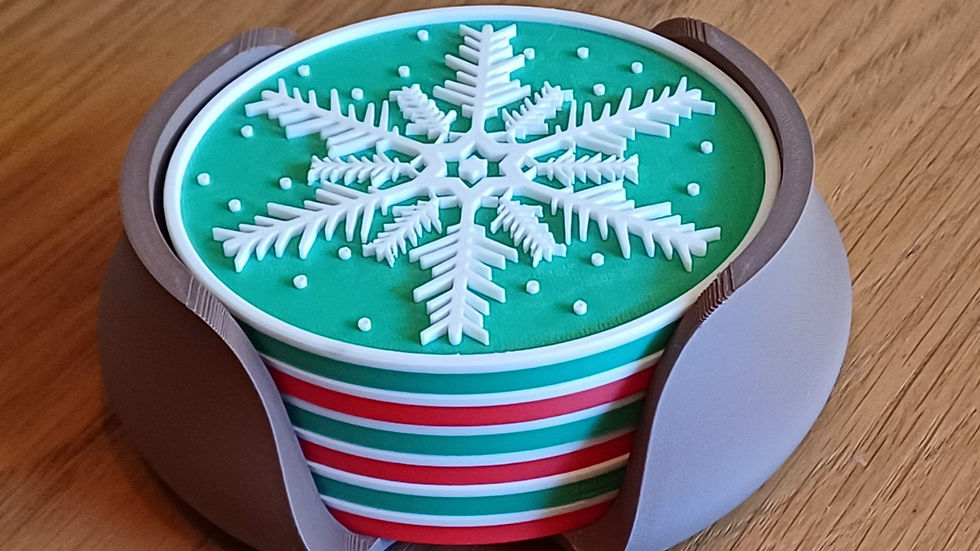 Festive coasters with a 3D-printed snowflake design in a decorative holder, ideal for adding holiday cheer to any tabletop.