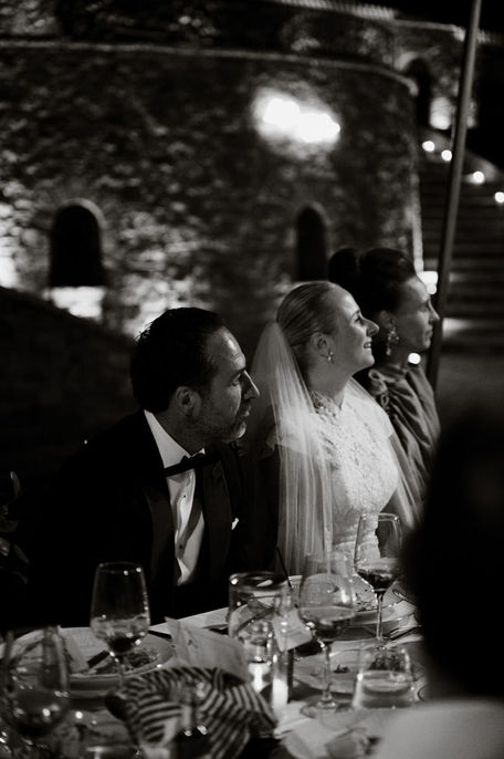 Night reception toast with U.S. couple, Athens Riviera wedding