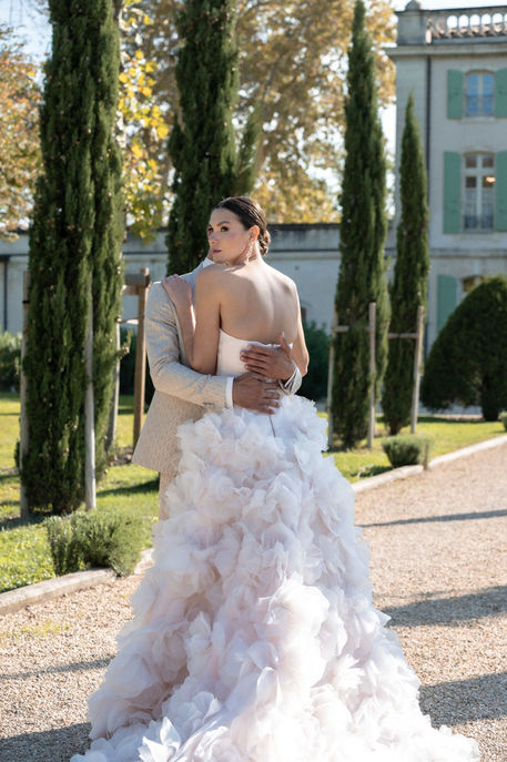 Bride and groom portrait blending architecture and emotion at Château de Tourreau